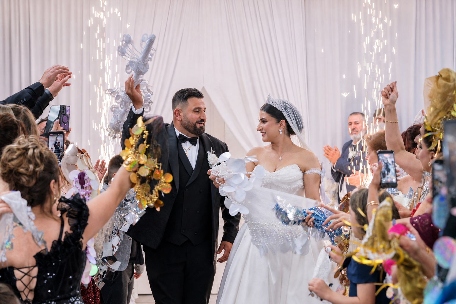 Assyrian bride and groom entering their Sydney wedding reception through a Khigga celebration photographed by HAP FILM