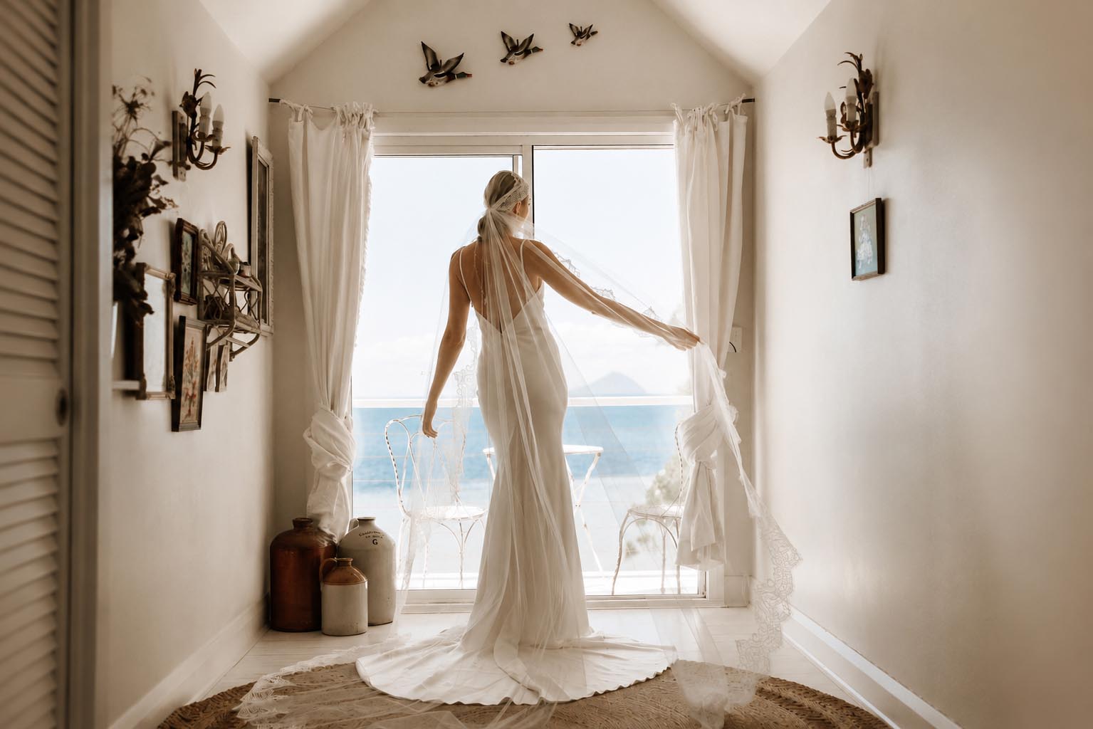Bride overlooking the ocean at 55 Fifty Five in Port Stephens NSW